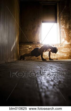 Caucasian man doing push-ups View Large Photo Image Stock Photography - Caucasian man doing push-ups. Fotosearch