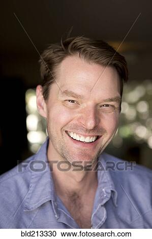Stock Image - Caucasian man smiling. Fotosearch