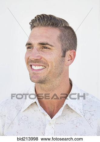 Stock Photo - Caucasian man smiling. Fotosearch