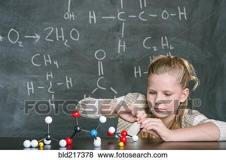 Caucasian student building molecular model in science class View Large Photo Image Stock Photo - Caucasian student building molecular model in science class. Fotosearch