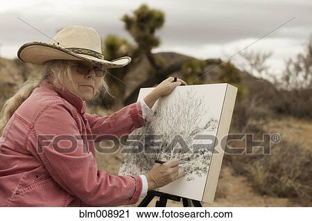 Caucasian woman drawing outdoors View Large Photo Image Stock Image - Caucasian woman drawing outdoors. Fotosearch