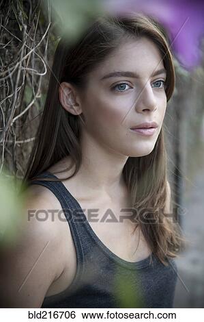 Caucasian woman near vines View Large Photo Image Stock Photograph - Caucasian woman near vines. Fotosearch