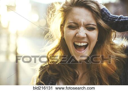 Caucasian woman shouting outdoors View Large Photo Image Stock Image - Caucasian woman shouting outdoors. Fotosearch