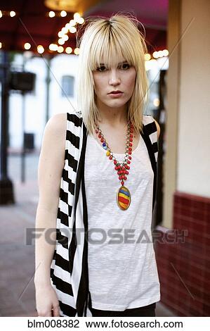Caucasian woman standing in fashionable clothing View Large Photo Image Stock Image - Caucasian woman standing in fashionable clothing. Fotosearch