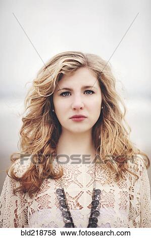 Stock Photo - Caucasian woman standing outdoors. Fotosearch
