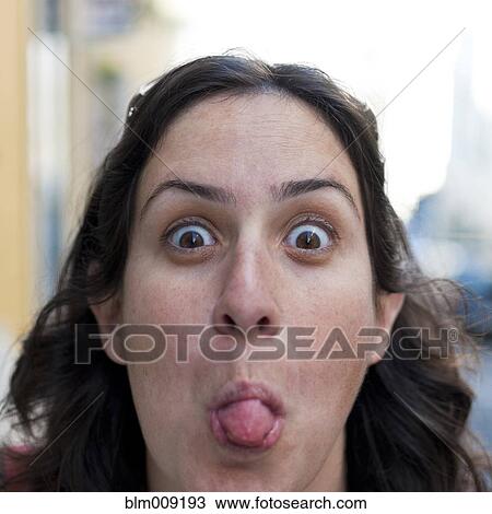 Caucasian woman sticking out tongue View Large Photo Image Stock Image - Caucasian woman sticking out tongue. Fotosearch