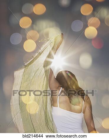 Picture - Caucasian woman waving scarf. Fotosearch
