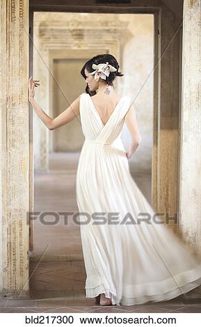 Caucasian woman wearing evening gown View Large Photo Image Stock Image - Caucasian woman wearing evening gown. Fotosearch