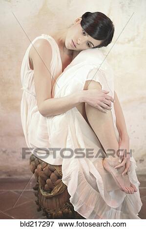 Stock Photo - Caucasian woman wearing flowing gown. Fotosearch