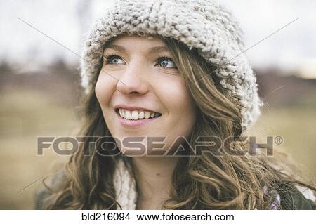 Picture - Caucasian woman wearing knitted cap. Fotosearch