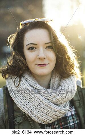 Picture - Caucasian woman wearing knitted scarf. Fotosearch