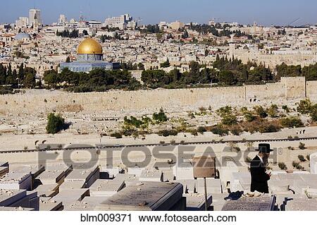 Cemetery and city rooftops View Large Photo Image Stock Image - Cemetery and city rooftops. Fotosearch