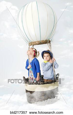 Children playing in pretend hot air balloon View Large Photo Image Stock Photo - Children playing in pretend hot air balloon. Fotosearch