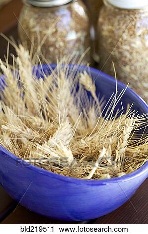 Stock Image - Close up of bowl of wheat chaffs. Fotosearch