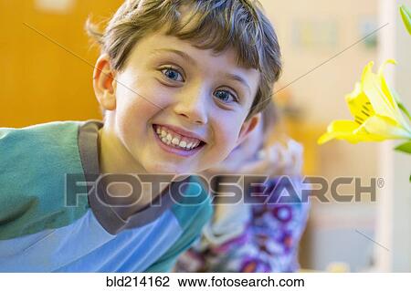 Close up of boy smiling View Large Photo Image Stock Image - Close up of boy smiling. Fotosearch