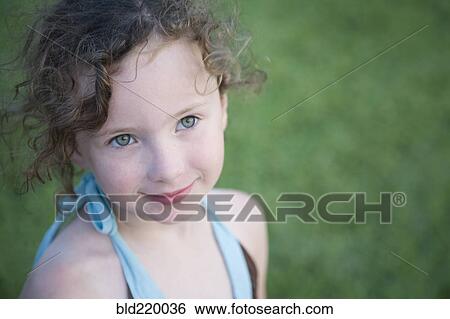 Close up of Caucasian girl smiling outdoors View Large Photo Image Stock Photograph - Close up of Caucasian girl smiling outdoors. Fotosearch