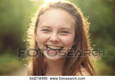 Stock Photography - Close up of Caucasian girl smiling. Fotosearch