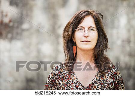 Stock Photography - Close up of Caucasian woman with serious expression. Fotosearch