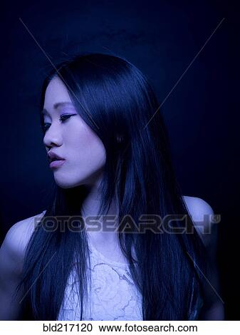Close up of Chinese woman with long hair View Large Photo Image Stock Image - Close up of Chinese woman with long hair. Fotosearch