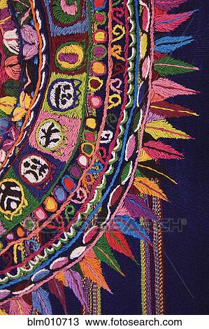 Stock Image - Close up of colorful embroidery. Fotosearch