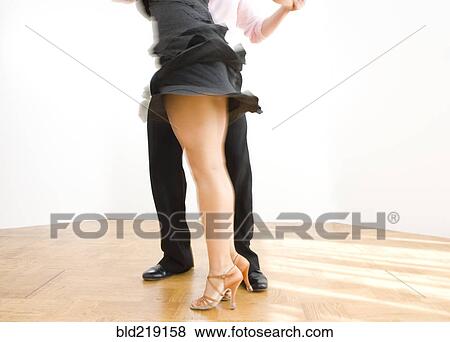 Close up of couple dancing in studio View Large Photo Image Stock Photo - Close up of couple dancing in studio. Fotosearch