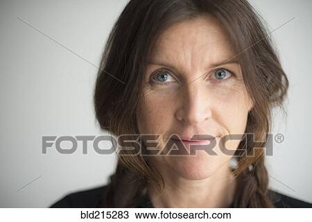 Stock Image - Close up of face of Caucasian woman. Fotosearch