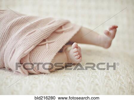 Close up of feet of newborn baby girl View Large Photo Image Stock Image - Close up of feet of newborn baby girl. Fotosearch