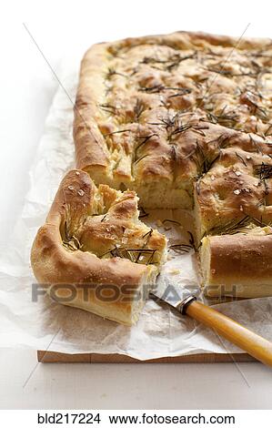 Close up of focaccia bread with herbs View Large Photo Image Picture - Close up of focaccia bread with herbs. Fotosearch