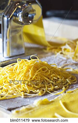 Stock Photo - Close up of fresh pasta noodles. Fotosearch
