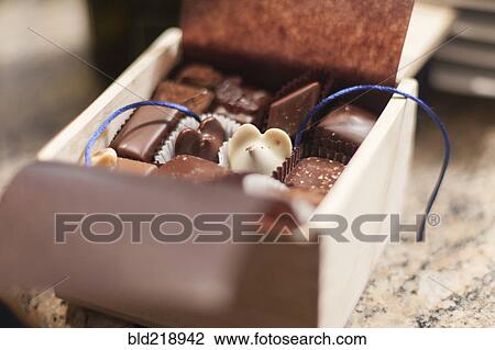 Stock Image - Close up of gift box of chocolates. Fotosearch