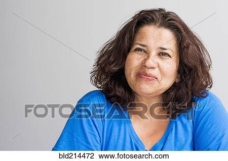 Close up of Hispanic woman smiling View Large Photo Image Stock Image - Close up of Hispanic woman smiling. Fotosearch