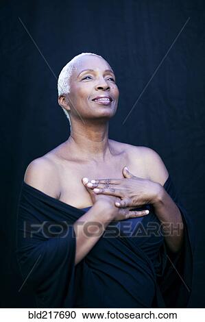 Close up of hopeful woman looking up View Large Photo Image Stock Image - Close up of hopeful woman looking up. Fotosearch