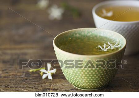 Stock Photo - Close up of jasmine tea in teacup. Fotosearch