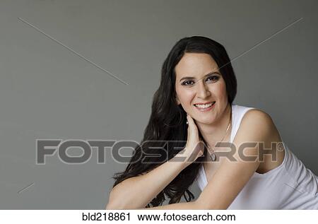 Close up of leaning smiling woman View Large Photo Image Stock Image - Close up of leaning smiling woman. Fotosearch
