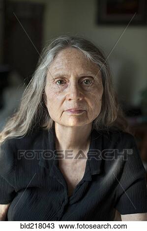 Stock Image - Close up of older woman. Fotosearch