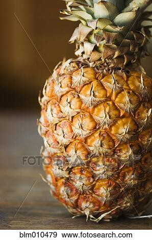 Close up of organic pineapple View Large Photo Image Stock Photo - Close up of organic pineapple. Fotosearch