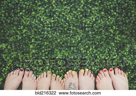 Close up of painted toenails or girls in grass View Large Photo Image Stock Image - Close up of painted toenails or girls in grass. Fotosearch
