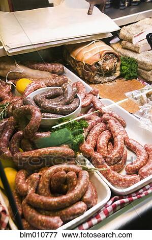 Close up of raw sausage in display case View Large Photo Image Stock Photo - Close up of raw sausage in display case. Fotosearch