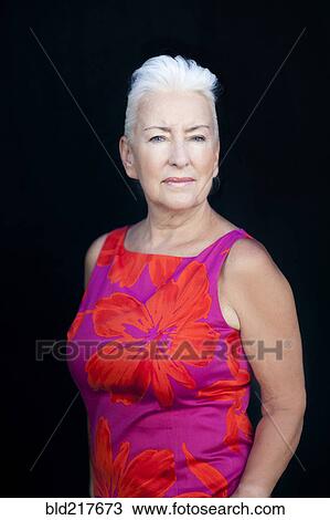 Stock Image - Close up of serious Caucasian woman. Fotosearch