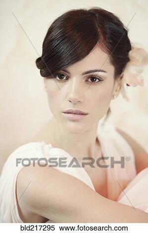 Stock Photography - Close up of serious Caucasian woman. Fotosearch