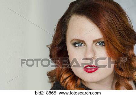 Stock Photography - Close up of serious glamorous woman. Fotosearch