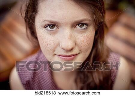 Stock Photo - Close up of serious teenage girl. Fotosearch