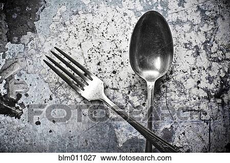 Close up of silver fork and spoon View Large Photo Image Stock Photo - Close up of silver fork and spoon. Fotosearch