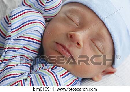 Close up of sleeping baby boy View Large Photo Image Stock Image - Close up of sleeping baby boy. Fotosearch
