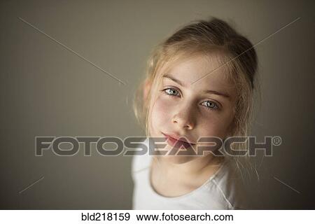 Stock Photo - Close up of smiling Caucasian girl. Fotosearch