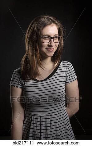 Close up of smiling Caucasian woman wearing eyeglasses View Large Photo Image Stock Image - Close up of smiling Caucasian woman wearing eyeglasses. Fotosearch
