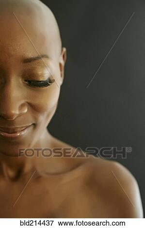 Stock Photo - Close up of smiling face of African American woman. Fotosearch