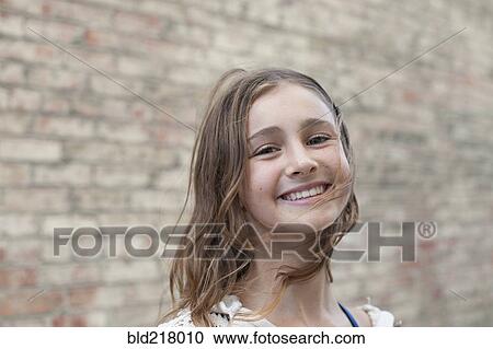 Close up of smiling girl View Large Photo Image Stock Image - Close up of smiling girl. Fotosearch