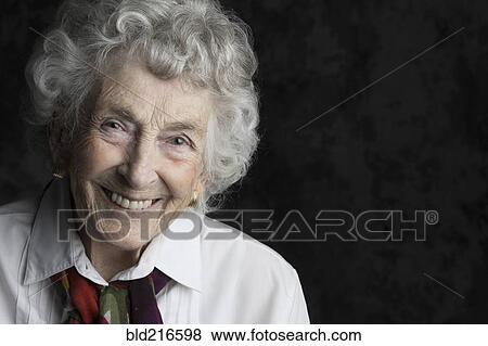 Close up of smiling older woman View Large Photo Image Stock Photo - Close up of smiling older woman. Fotosearch