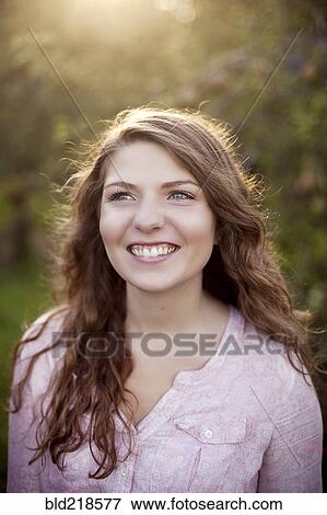 Close up of smiling woman View Large Photo Image Stock Photo - Close up of smiling woman. Fotosearch
